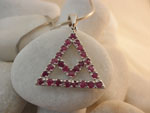 Symbolic traditional Sterling silver and Rubis pendant.. Ref. JGQ
