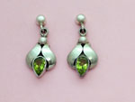 Ethnic Sterling silver earrings with faceted peridot gems.. Ref. NFY