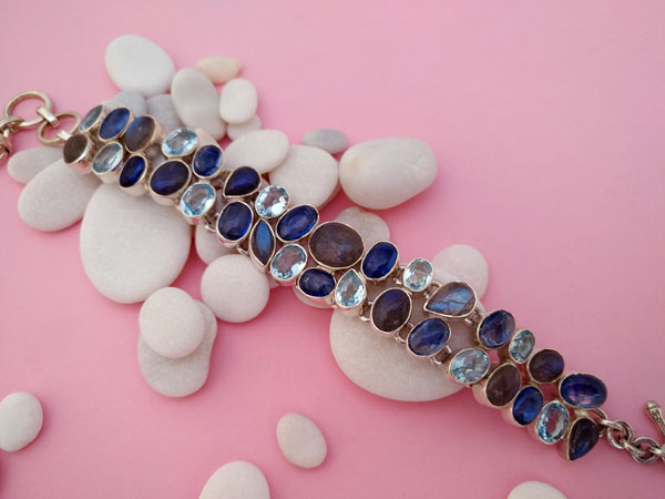 Sterling silver bracelet whit gems of aquamarine and tanzanite.. Foto 1