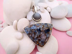 Sterling silver pendant with copper Calcite and Sapphire "cat's eye".. Ref. TLW