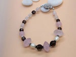 Silver bracelet with rose quartz, pearls and smoky quartz.. Ref. TXO