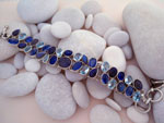 Sterling silver bracelet with aquamarine, tanzanite and labradorite gems.. Ref. TXV