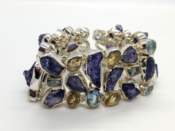 Silver bracelet with Tanzanite and Topaz gems.. Foto 1