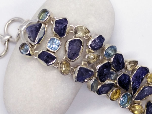 Silver bracelet with Tanzanite and Topaz gems.. Foto 2