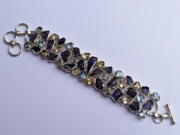 Silver bracelet with Tanzanite and Topaz gems.. Foto 4