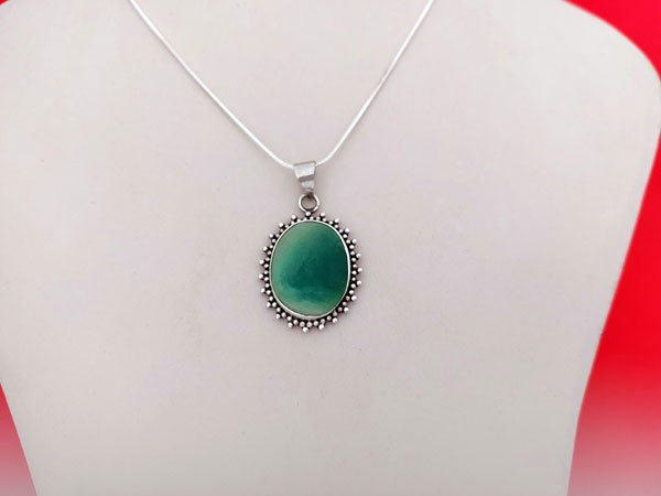 Ethnic silver and turquoise pendant.. Foto 1