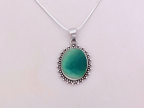 Ethnic silver and turquoise pendant.. Foto 2